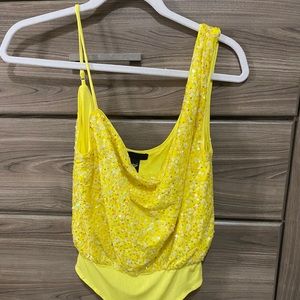 yellow sequin body suit